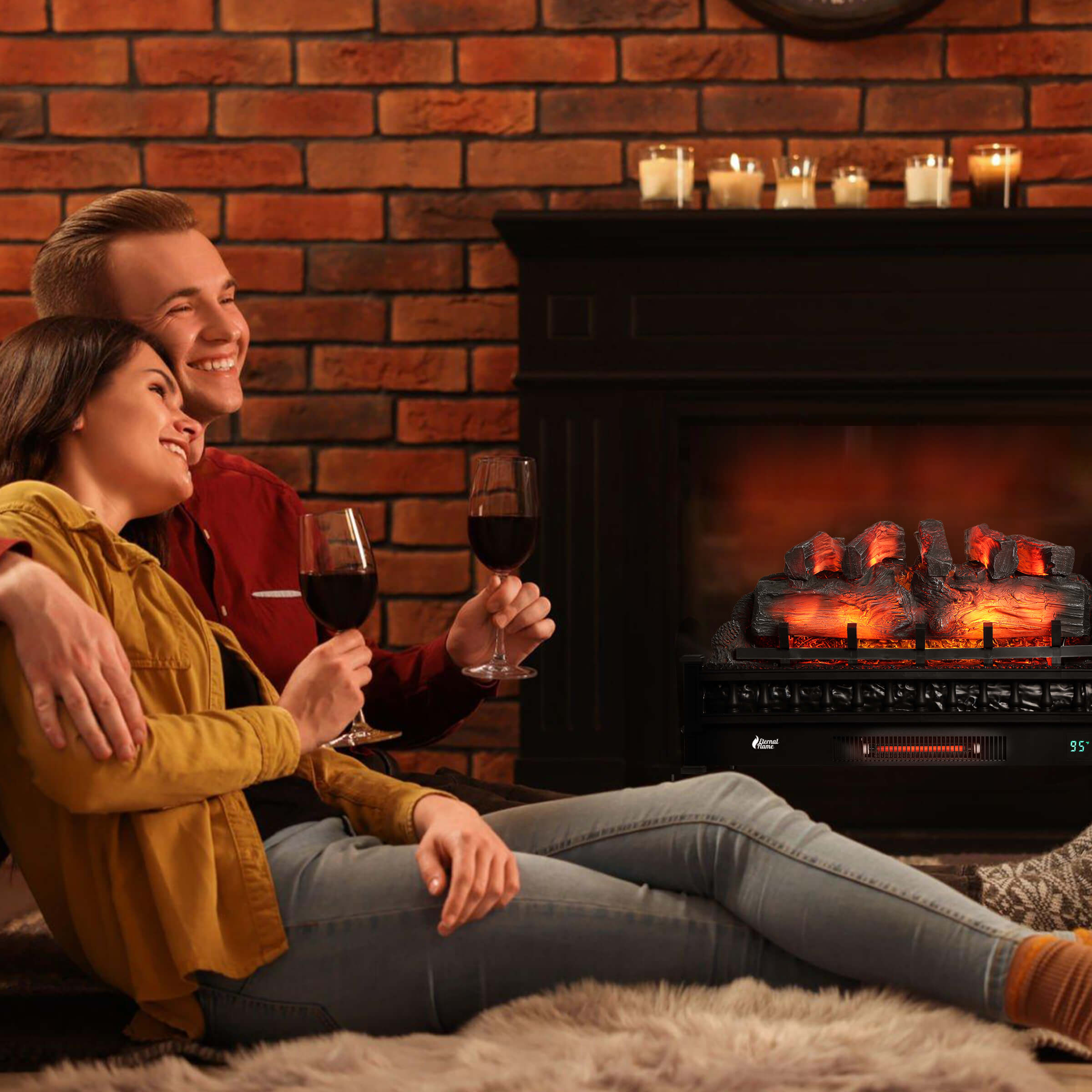 Electric fireplace with glowing orange log set