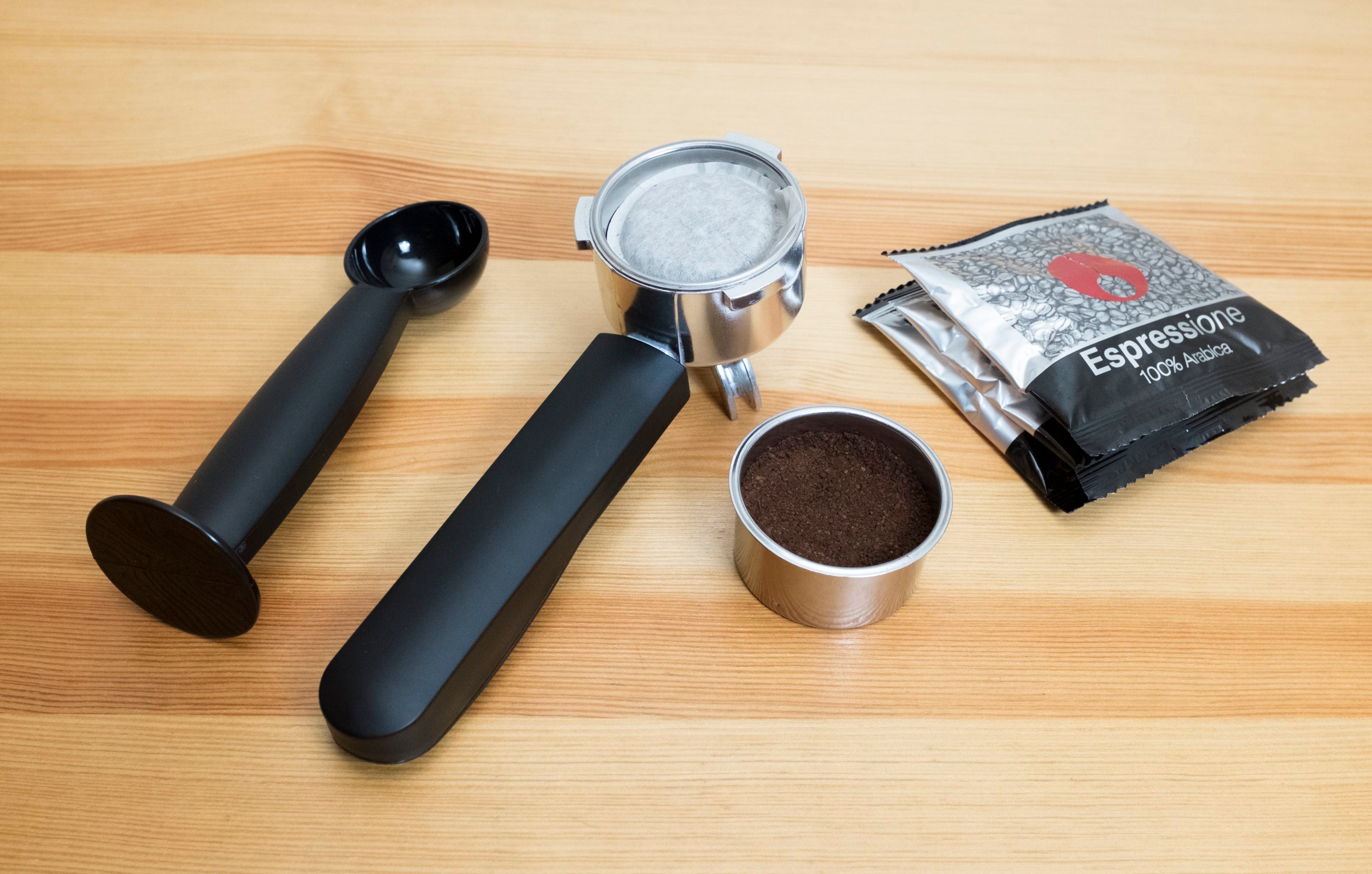 Espressione espresso machine accessories: tamper, scoop, packets, and measuring cup
