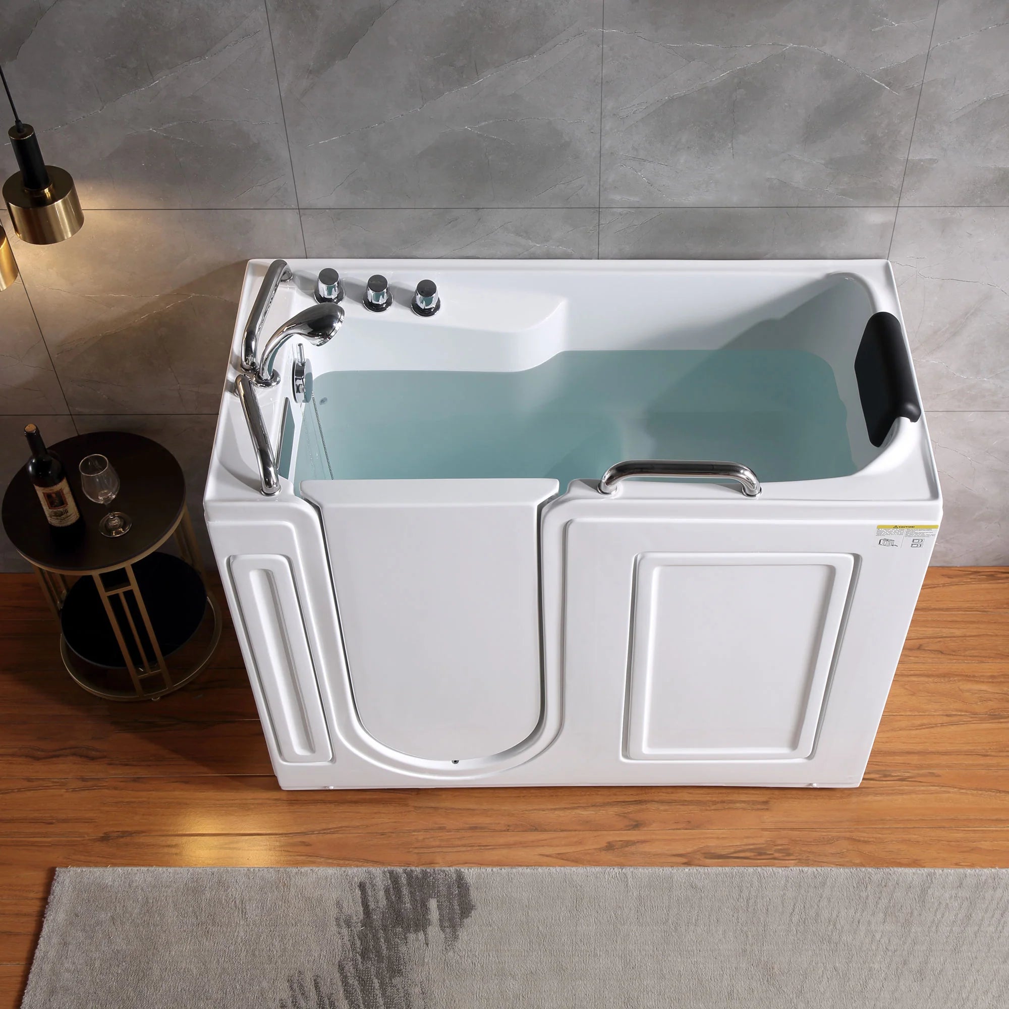 Walk-in soaking bathtub with chrome faucet, teal basin, and swing door