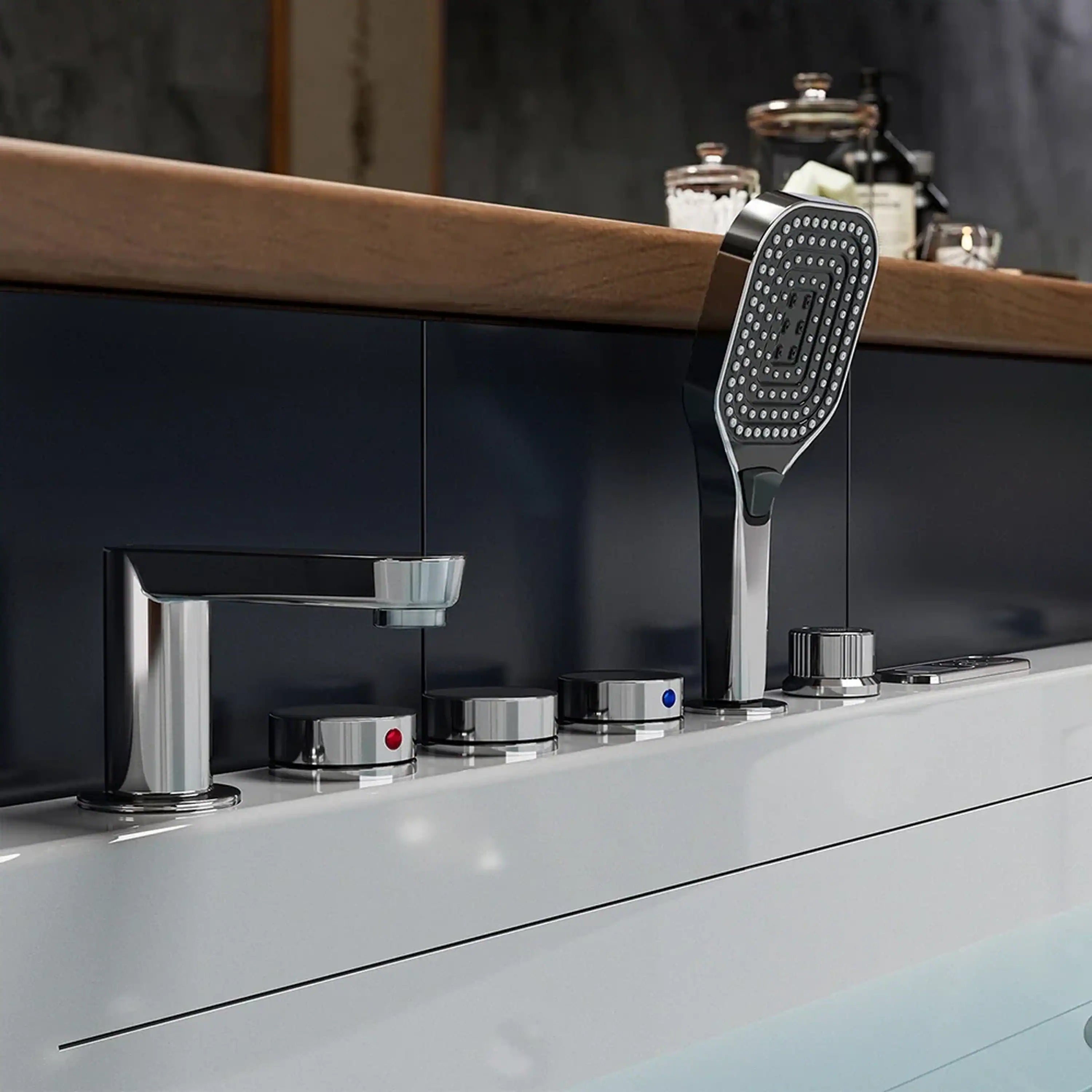 Chrome shower head and faucet controls on the deck of a white whirlpool tub