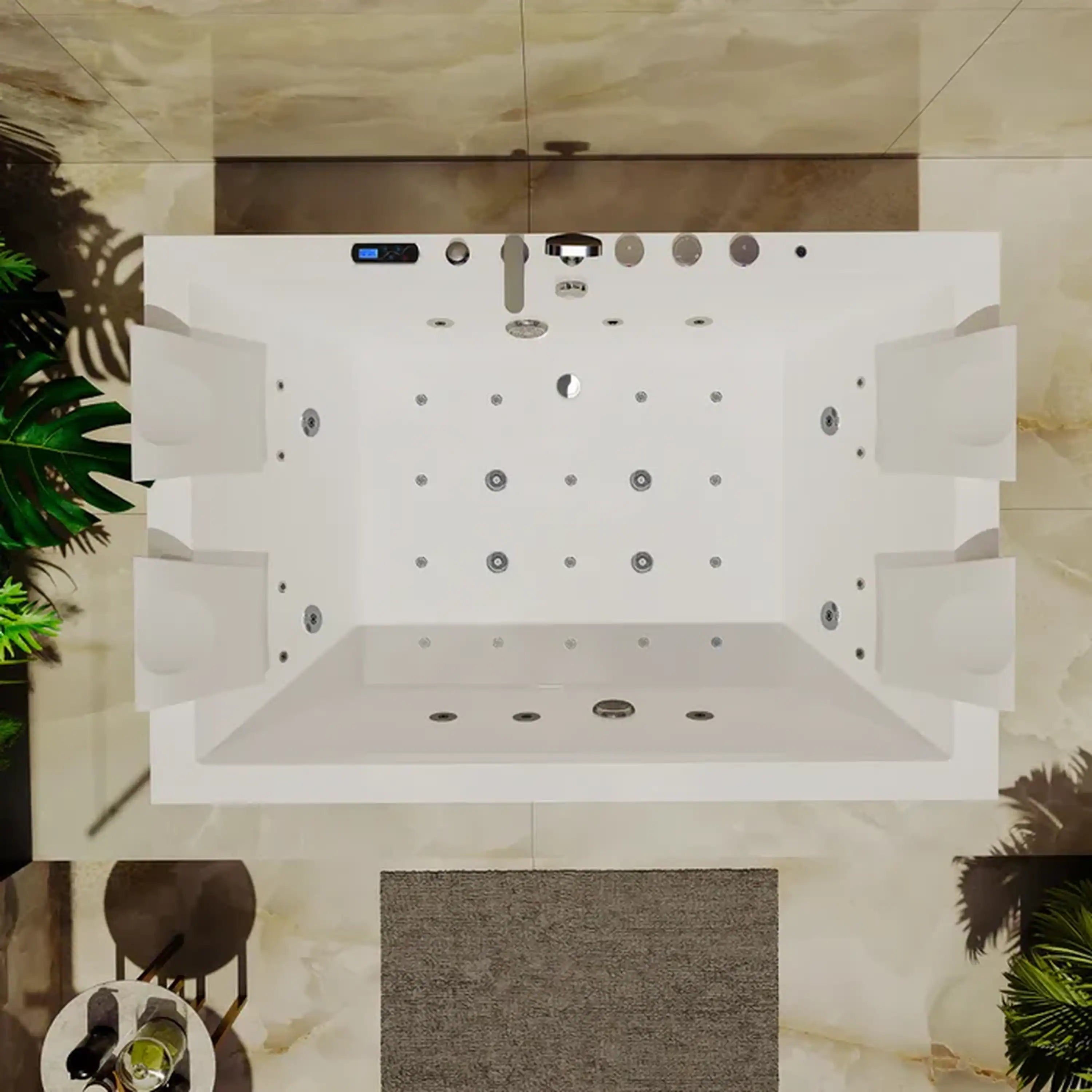 White alcove whirlpool bathtub interior with many jet nozzles and center wall fittings