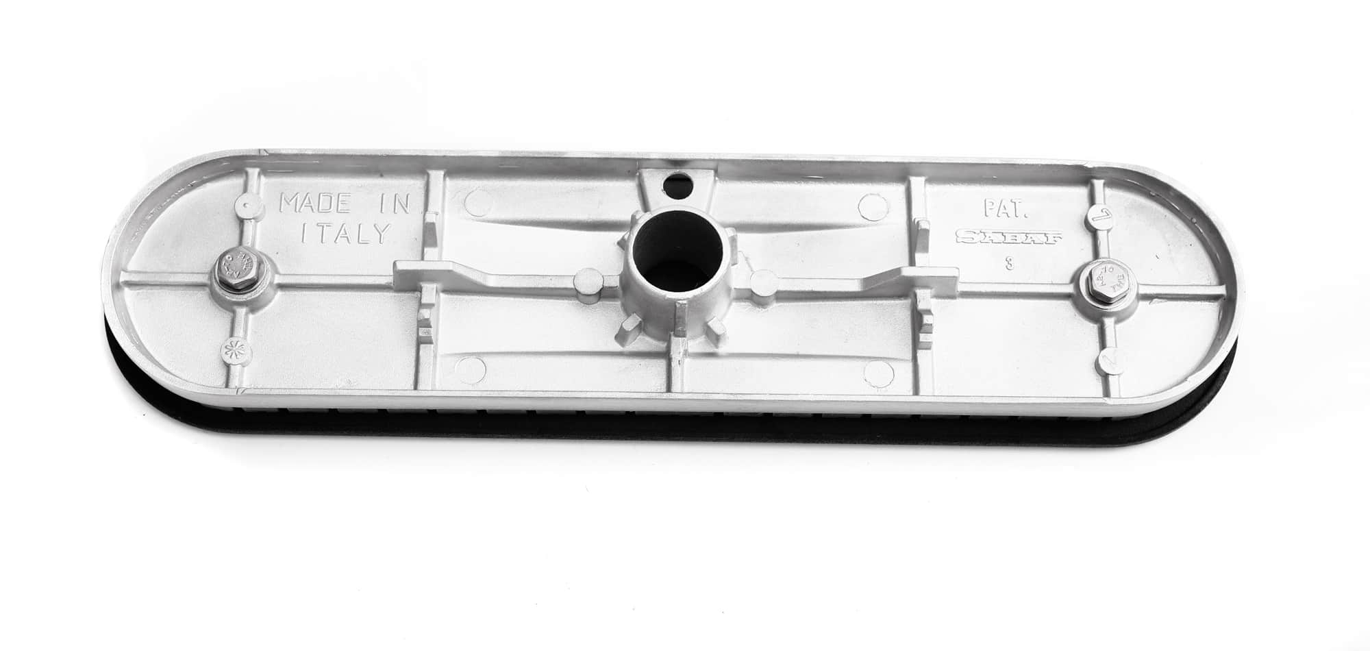 Gas range burner cover plate underside with Made in Italy marking