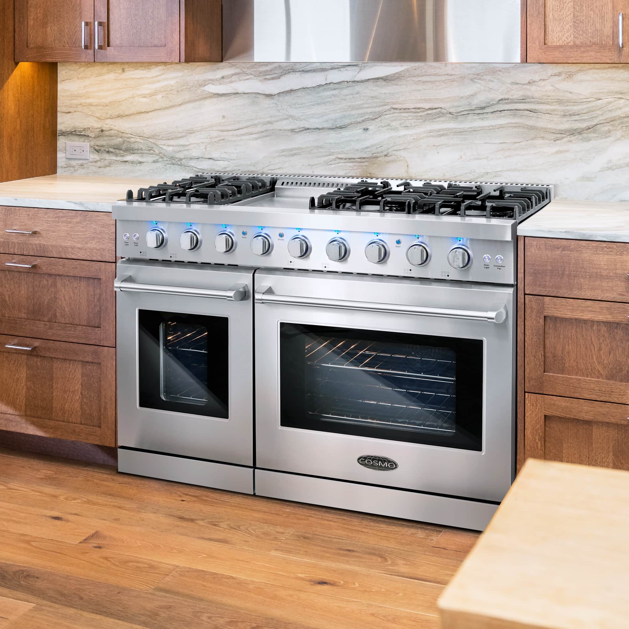 Stainless steel double oven gas range with six burners, control knobs, two oven doors