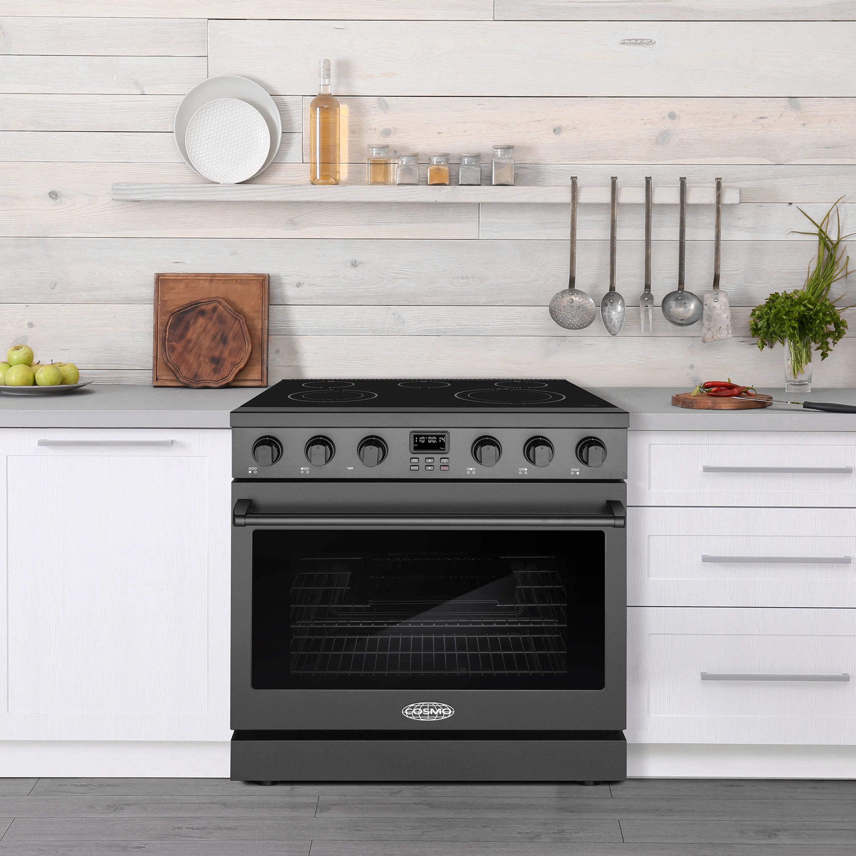 Matte black 36-inch electric range with coil cooktop and closed oven door