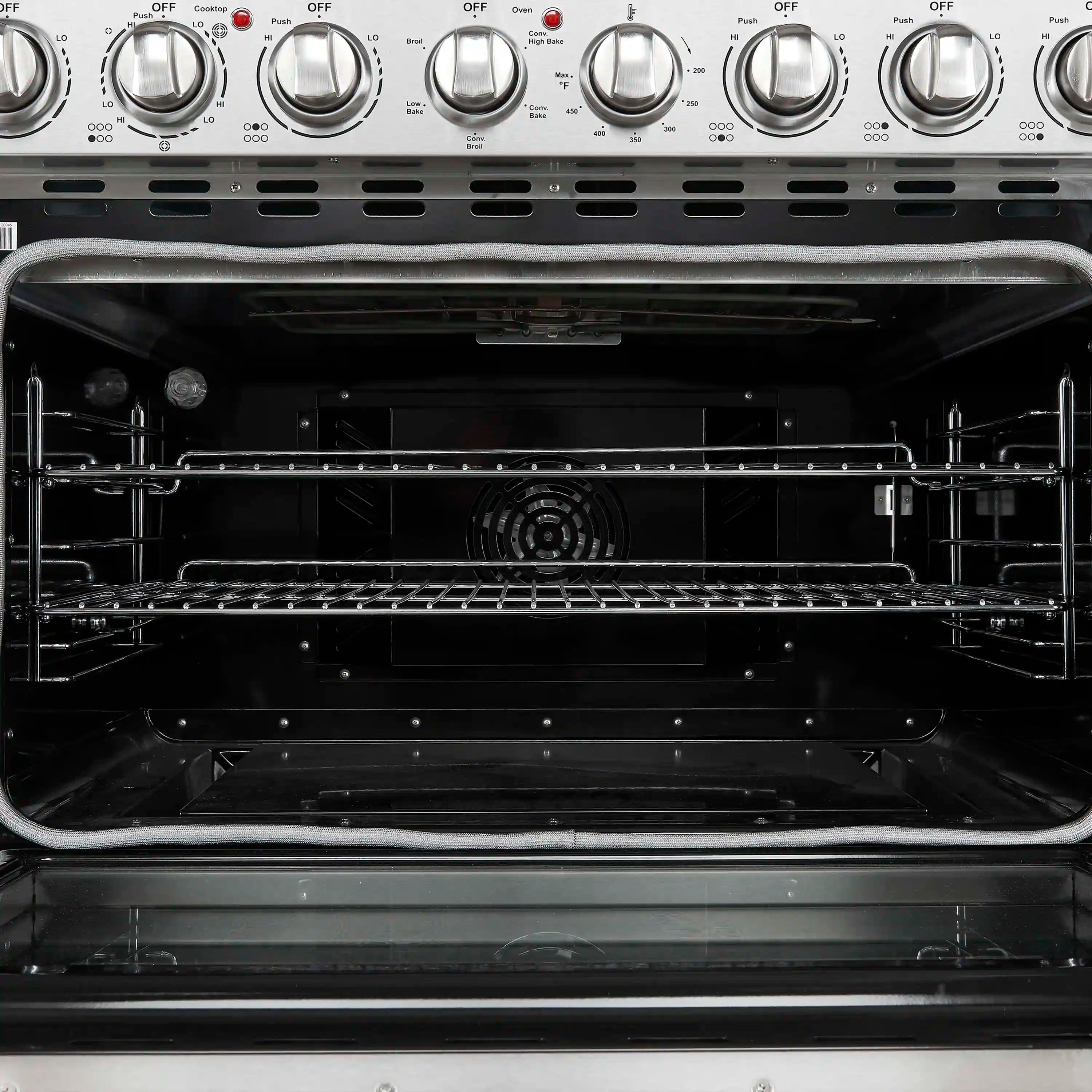 Stainless steel electric range oven with multiple racks and broil/bake elements visible