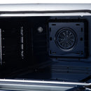Electric oven door interior view with round convection vent and side rack supports