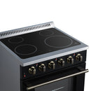 Black electric cooktop with four radiant burner circles and antique brass control knobs