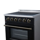 Black electric range with round gold control knobs and glass oven door window