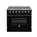 Black freestanding electric range with brass control knobs and closed oven door
