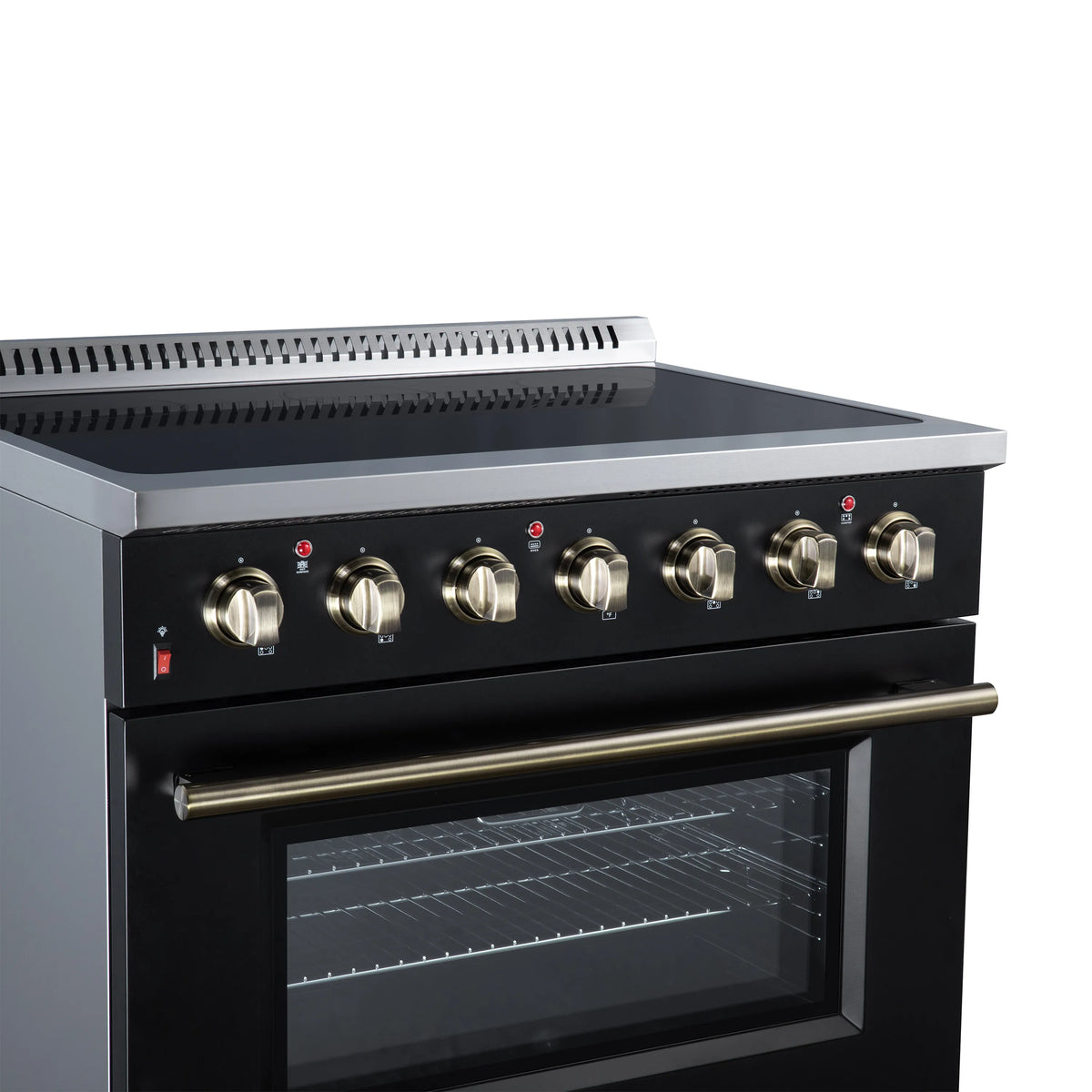 Black electric range control panel with brass knobs above oven door window