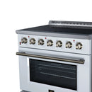 White electric range with brass-toned knobs, griddle top, and oven window