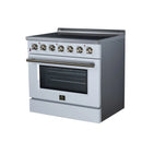 White freestanding electric range with oven window and brass-toned control knobs