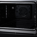 Black oven cavity with circular fan vent, glass door opening, and metal bake racks