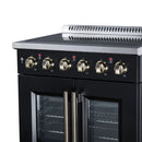 Black electric range front with radiant burner control knobs and two glass oven doors