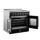 Black electric range with one oven door open, wire racks inside, gold trim handles