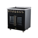 Black French-door electric range with two oven windows and brass-finish control knobs