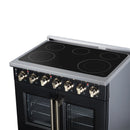 Black electric range with radiant cooktop, knob controls, and two glass oven doors