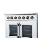 White electric range with radiant cooktop and double French oven doors with brass handles