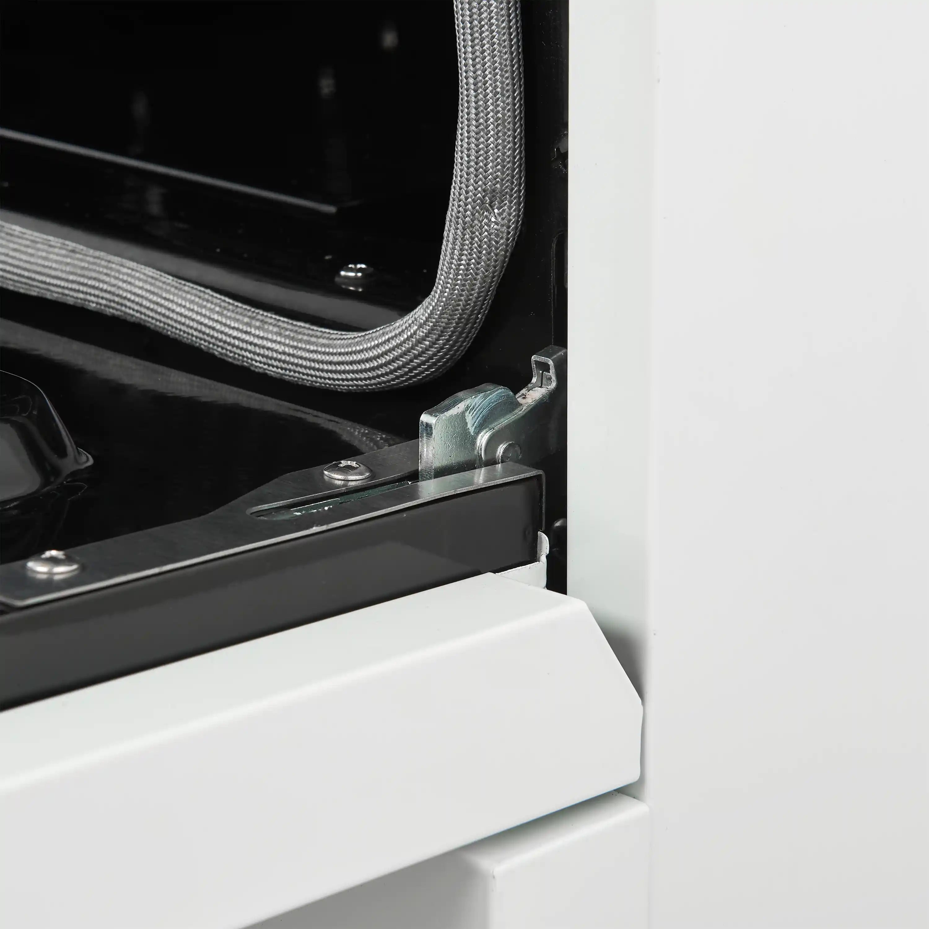 White dishwasher hose connection with metal mounting bracket