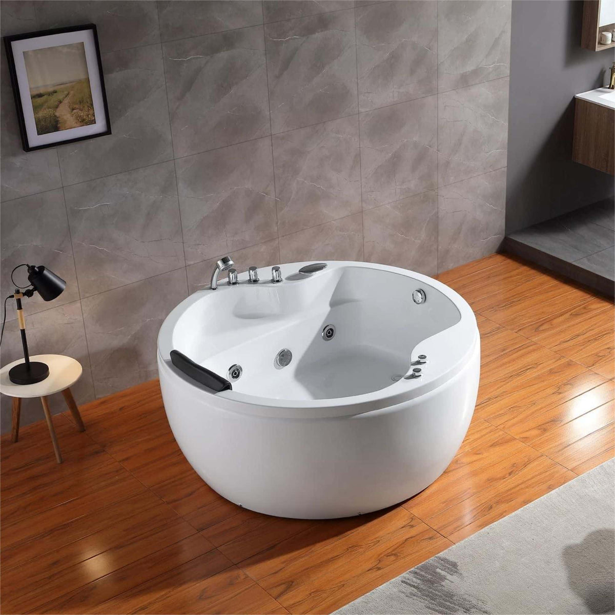 White round whirlpool bathtub with chrome faucet and adjustable jet controls