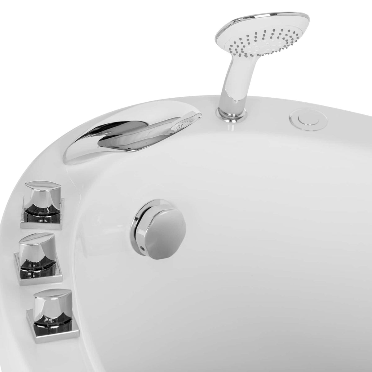 White bathtub with chrome shower head, controls, and faucet handle