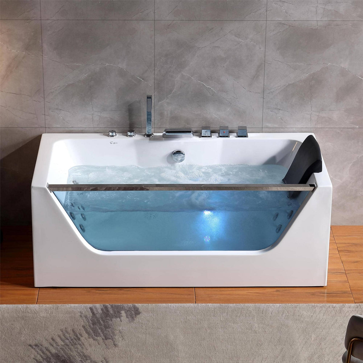 White rectangular whirlpool bathtub with jets and black headrest on the rim