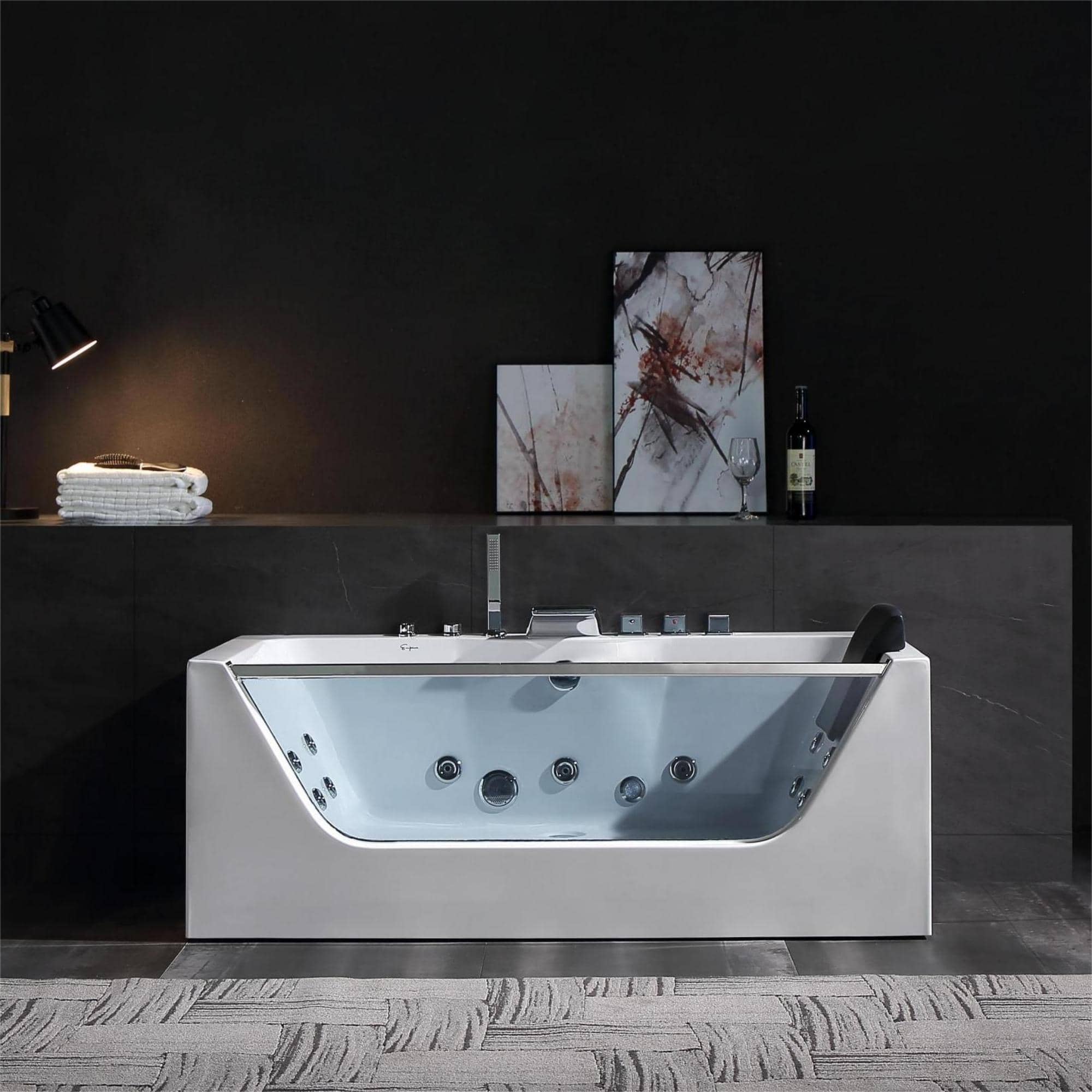 Rectangular whirlpool bathtub with LED-lit control panel and chrome faucet fixtures