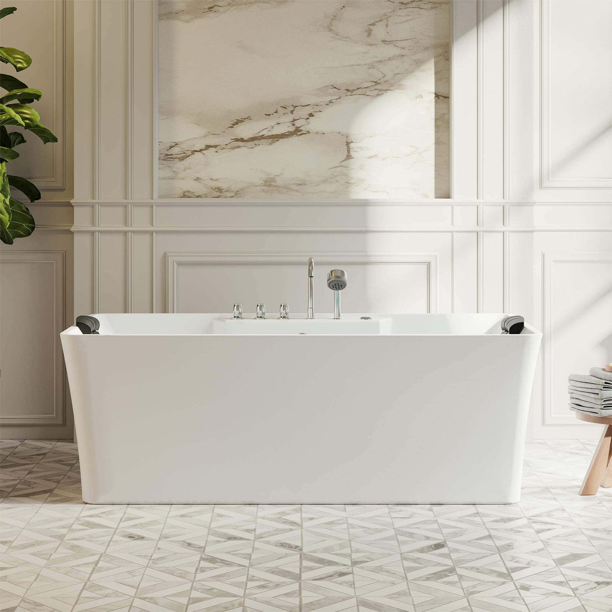 Freestanding white acrylic bathtub with chrome faucet and control knobs, front view