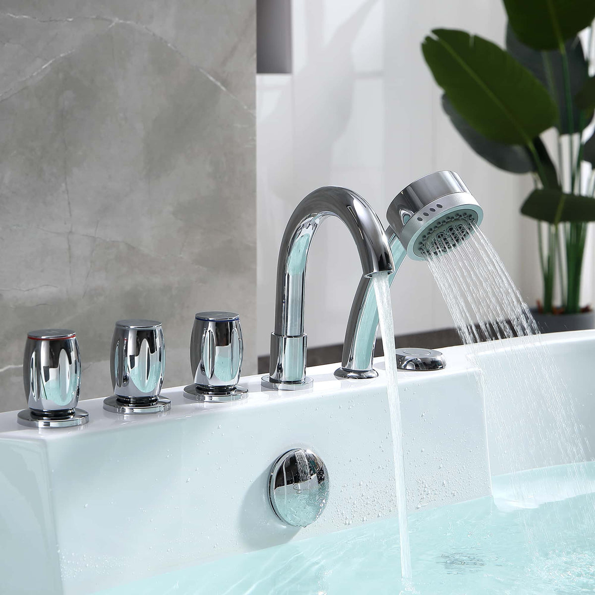 Chrome faucet and controls beside white whirlpool bathtub filled with light blue water