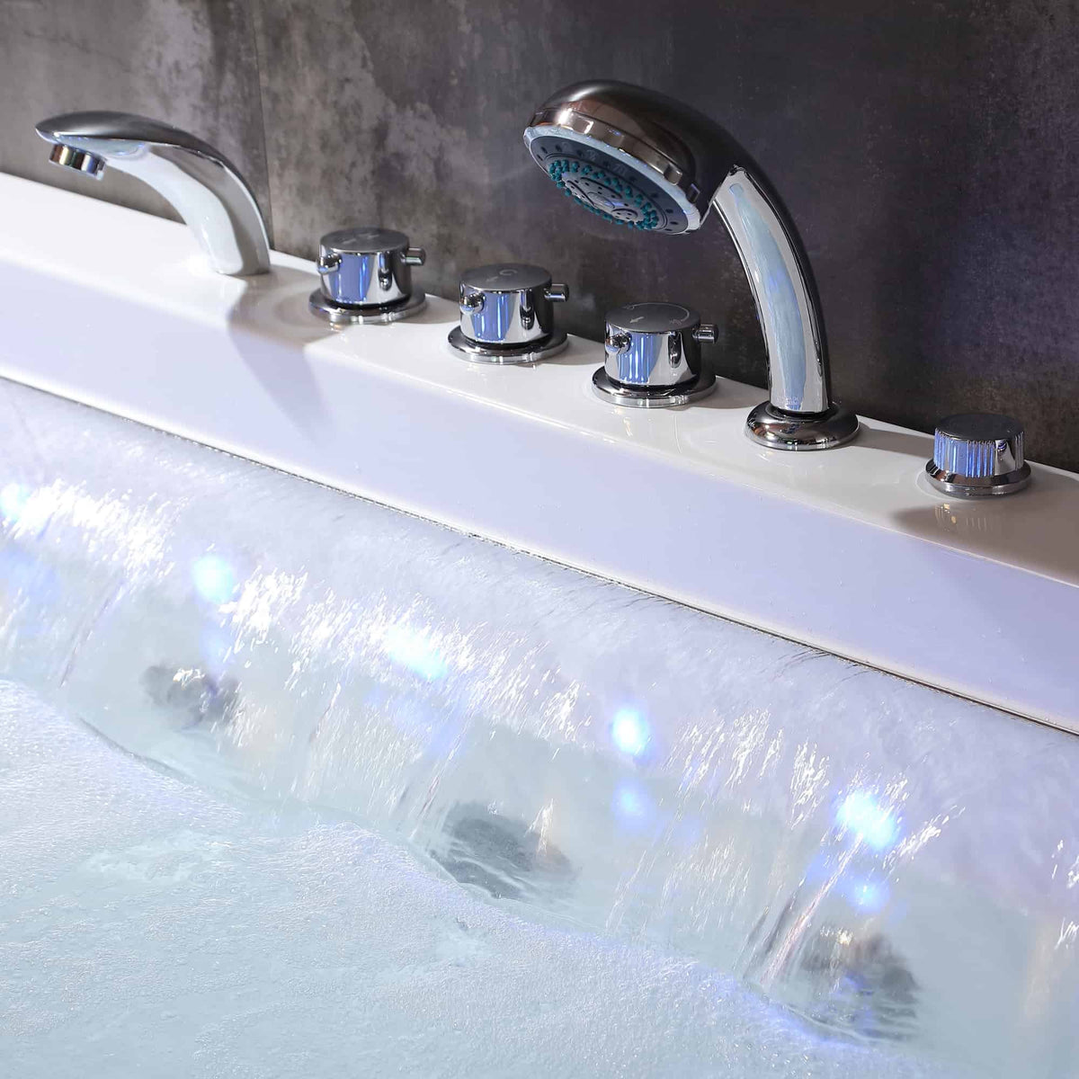 White whirlpool bathtub rim with chrome faucet and showerhead jets