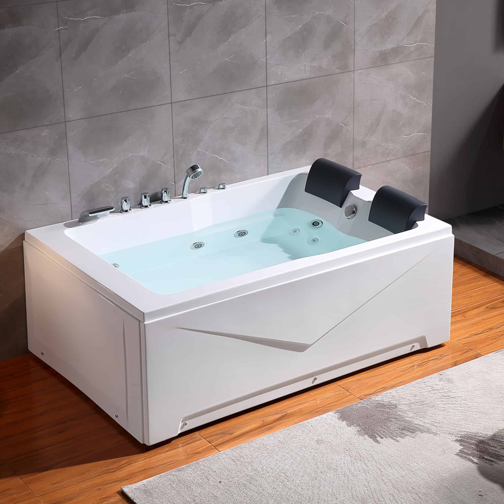 White acrylic alcove whirlpool bathtub with jets and built-in dark headrests