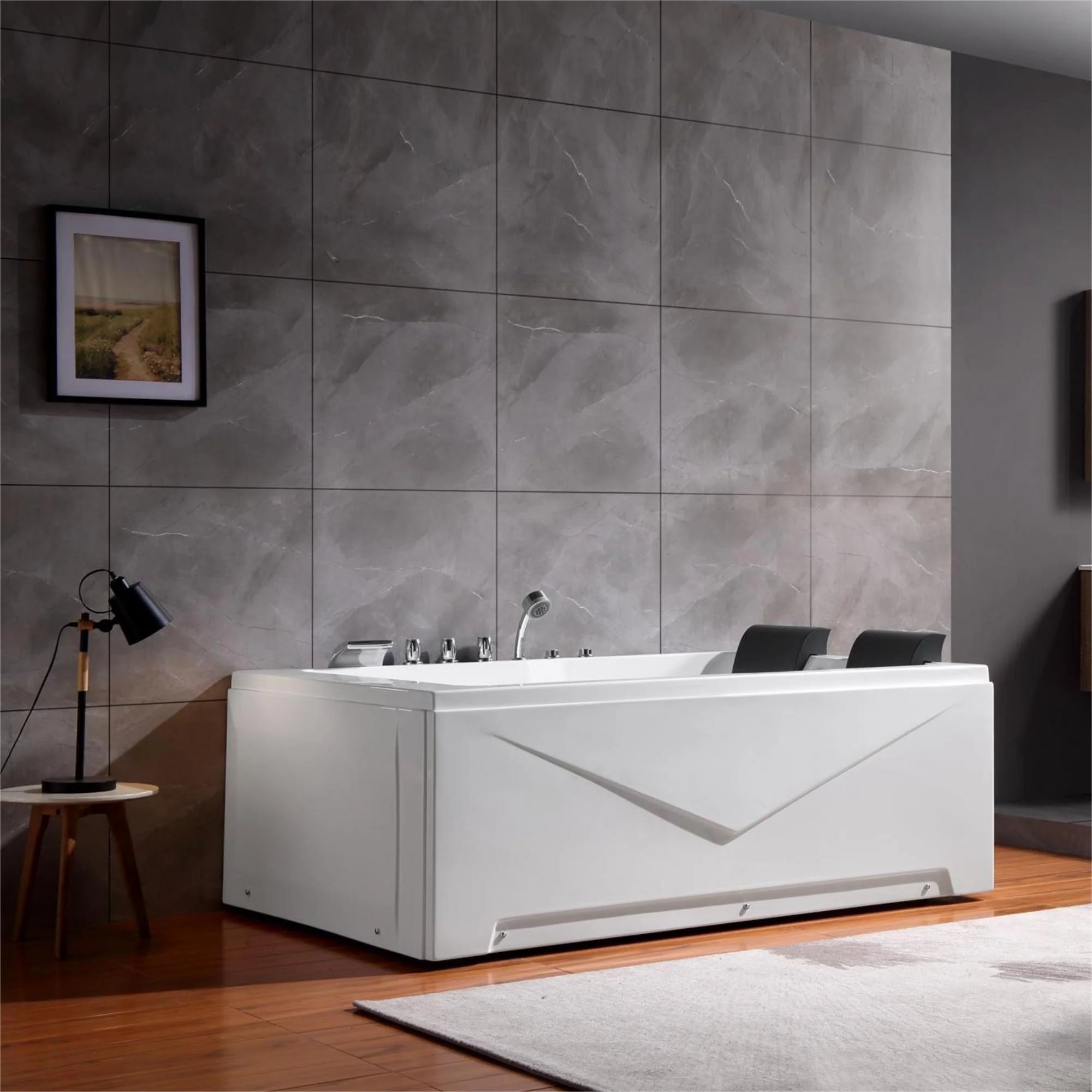White alcove whirlpool bathtub with glossy jet openings and two black headrests
