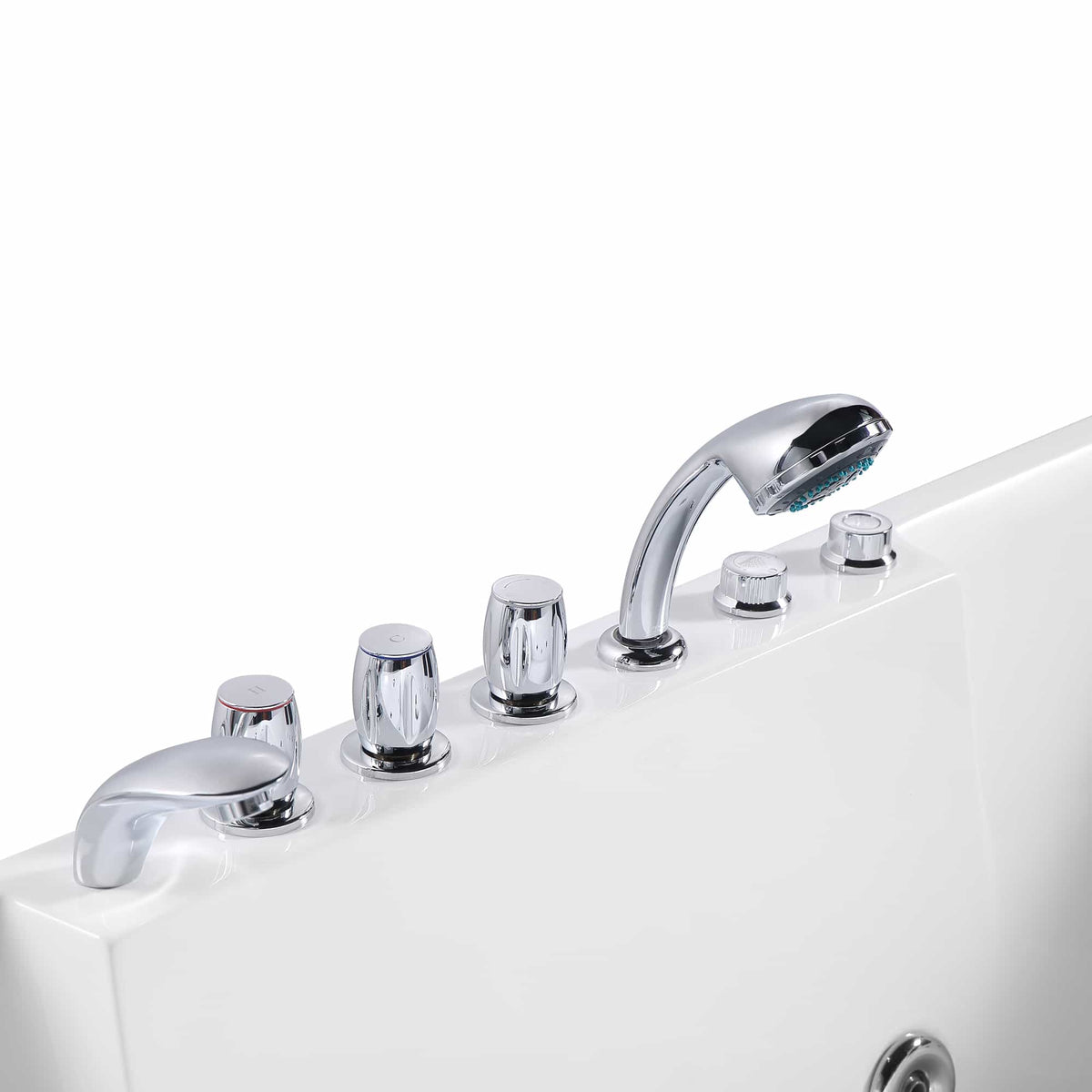 Chrome faucet and control knobs on the rim of a white whirlpool bathtub