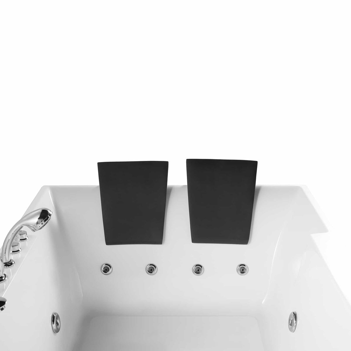White whirlpool bathtub with two black headrests and visible jet nozzles