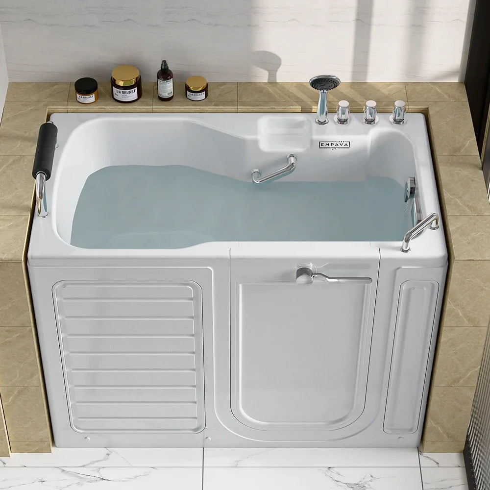 White alcove walk-in soaking tub with right-side door panel and chrome faucet controls