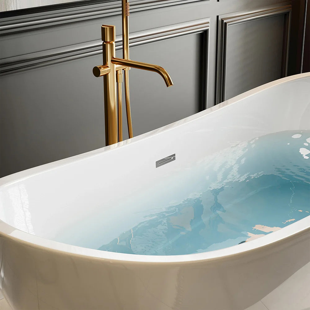White soaking tub with gold faucet, water-filled interior close-up