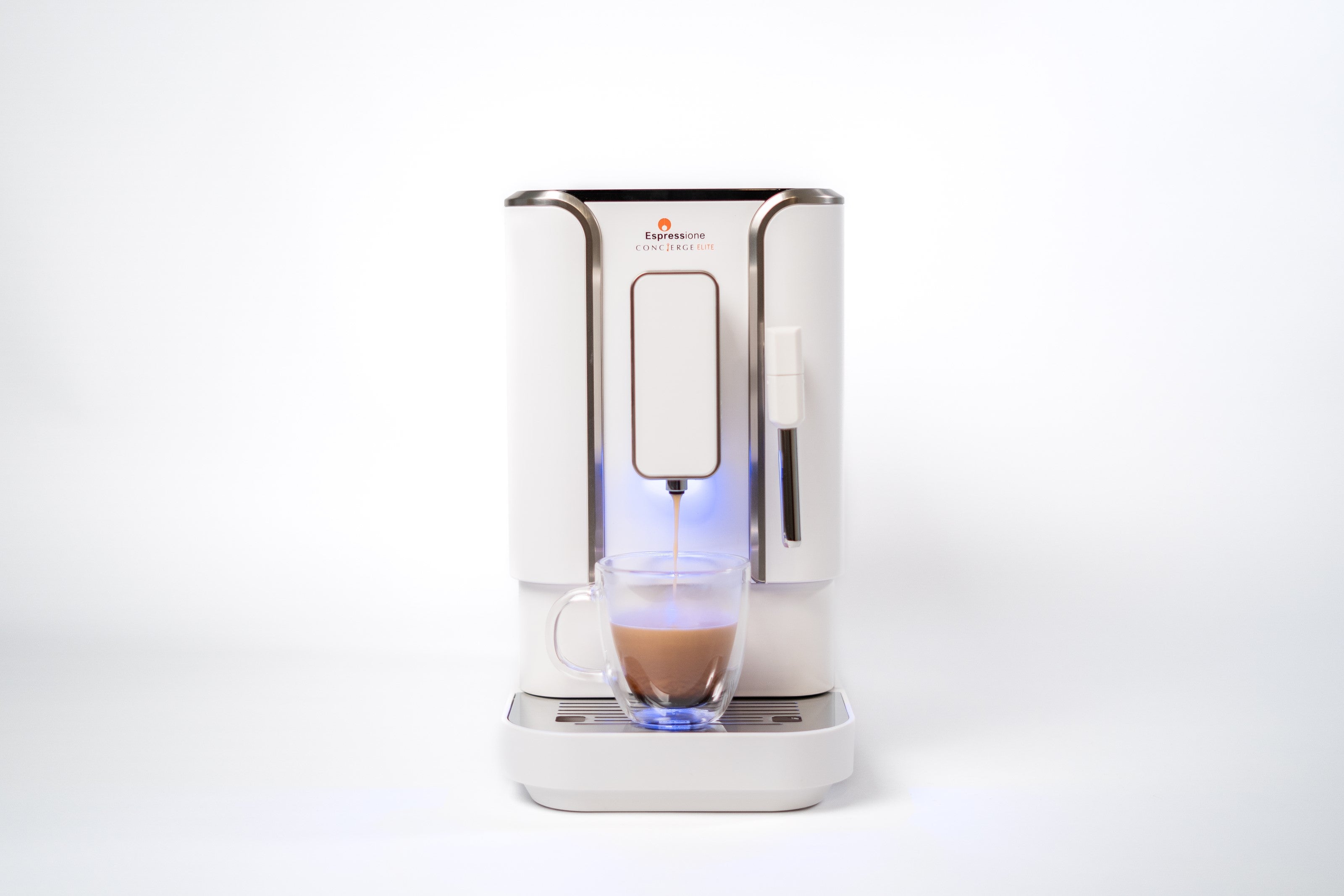 Diamond white fully automatic espresso machine on base with glass cup and blue light