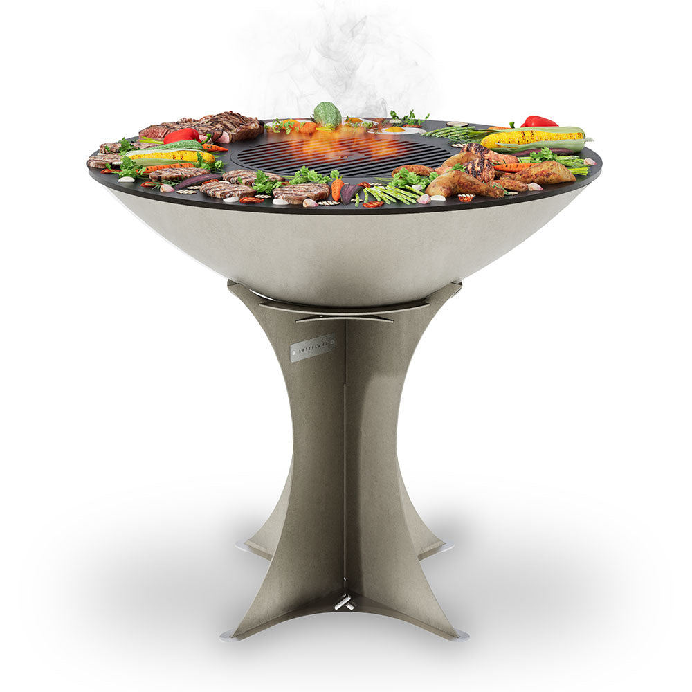 Stainless silver flat-top charcoal grill with wide base and multi-zone cooking grate
