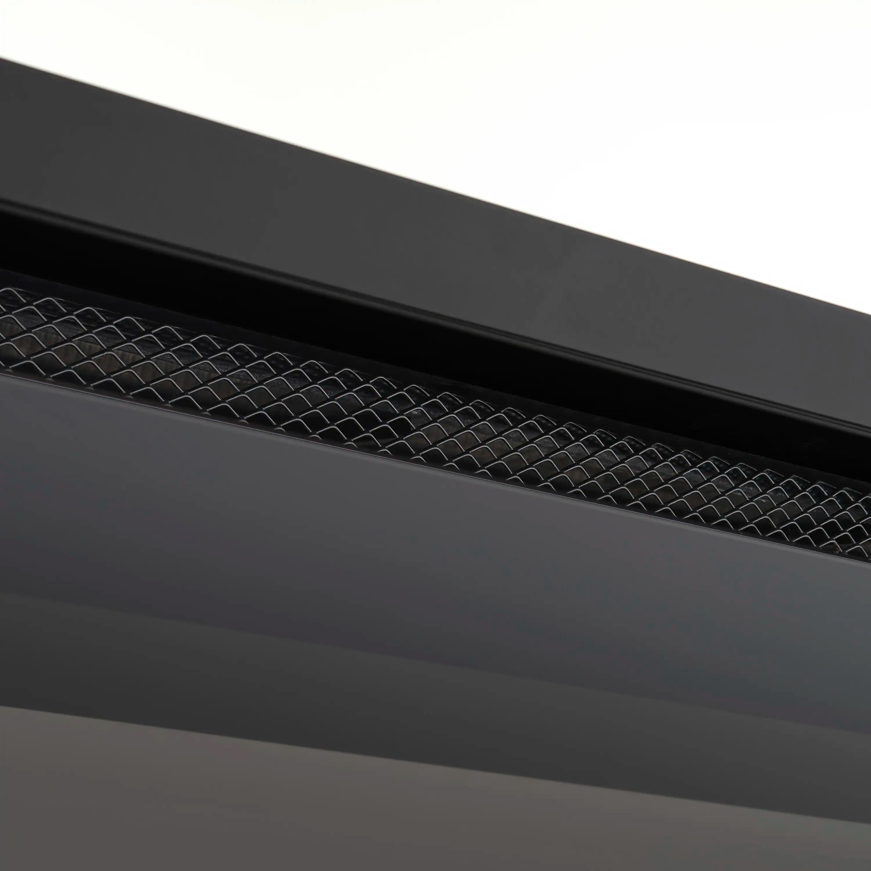 Built-in linear electric fireplace flame bed detail with black mesh grate