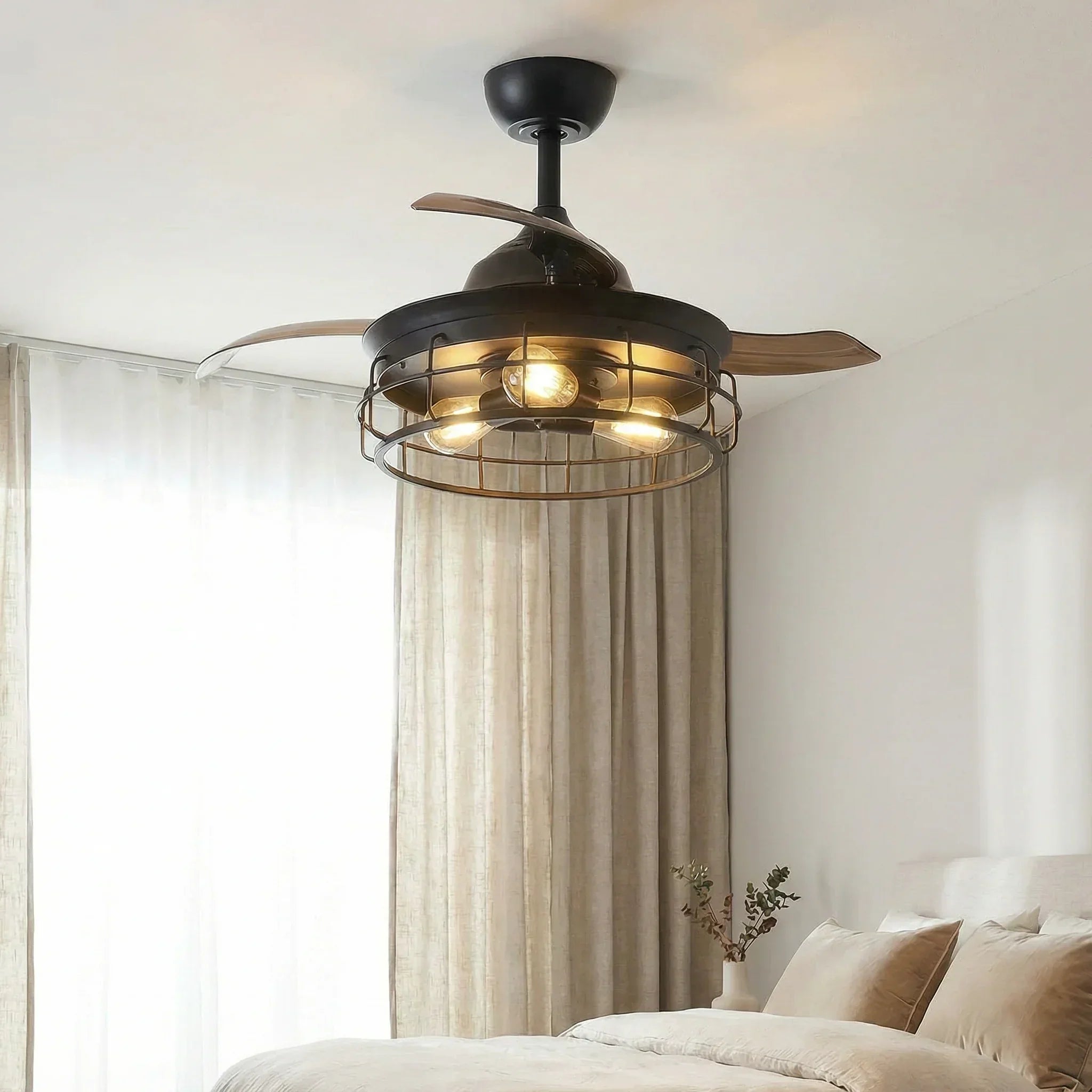 Black industrial ceiling fan with wire cage light and four brown blades