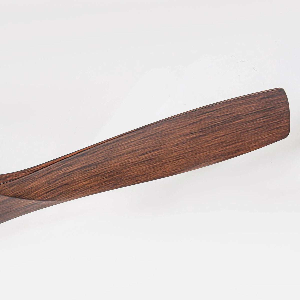 Wood ceiling fan blade with textured grain detail, single blade close-up