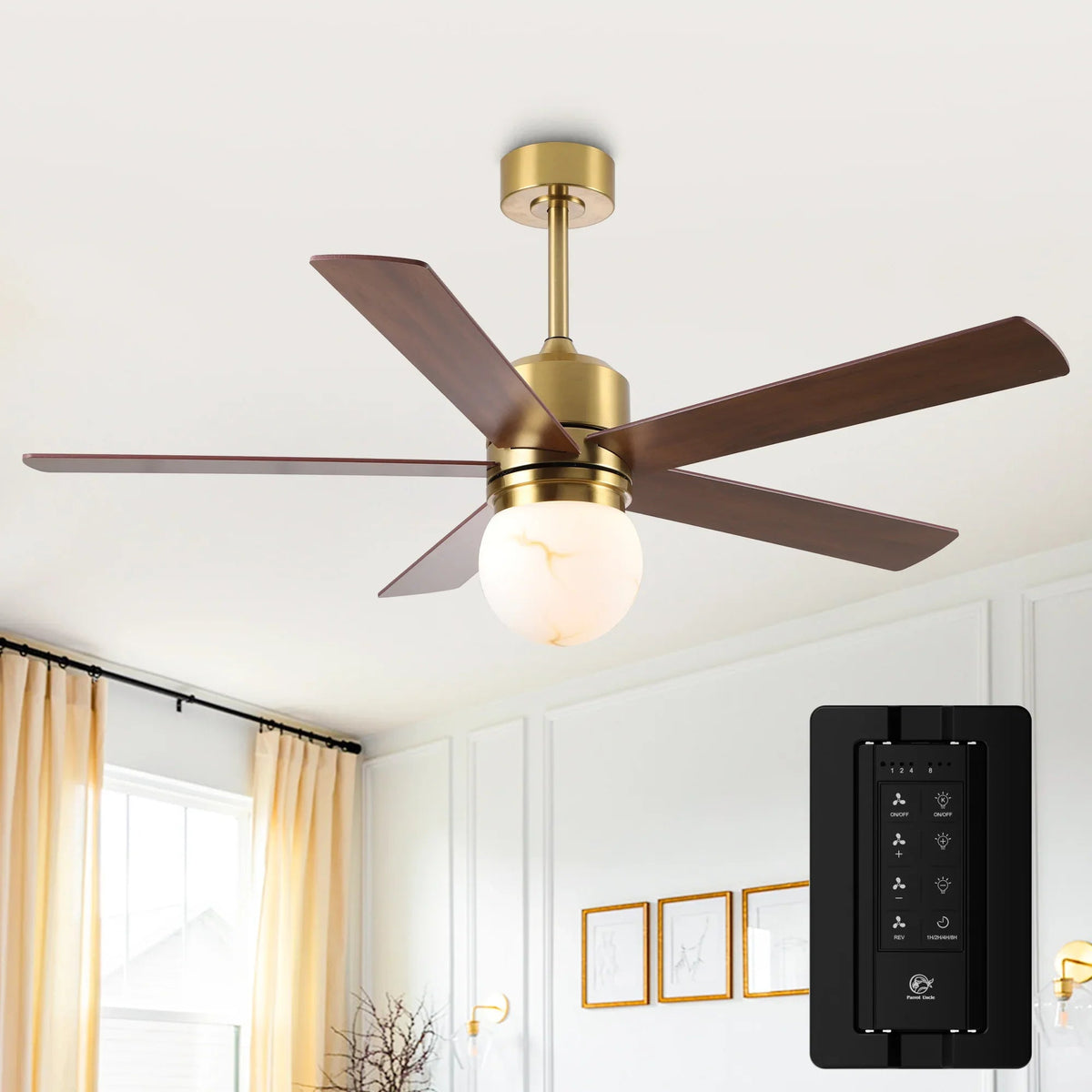 Golden ceiling fan with dark blades and frosted LED globe plus matching remote control