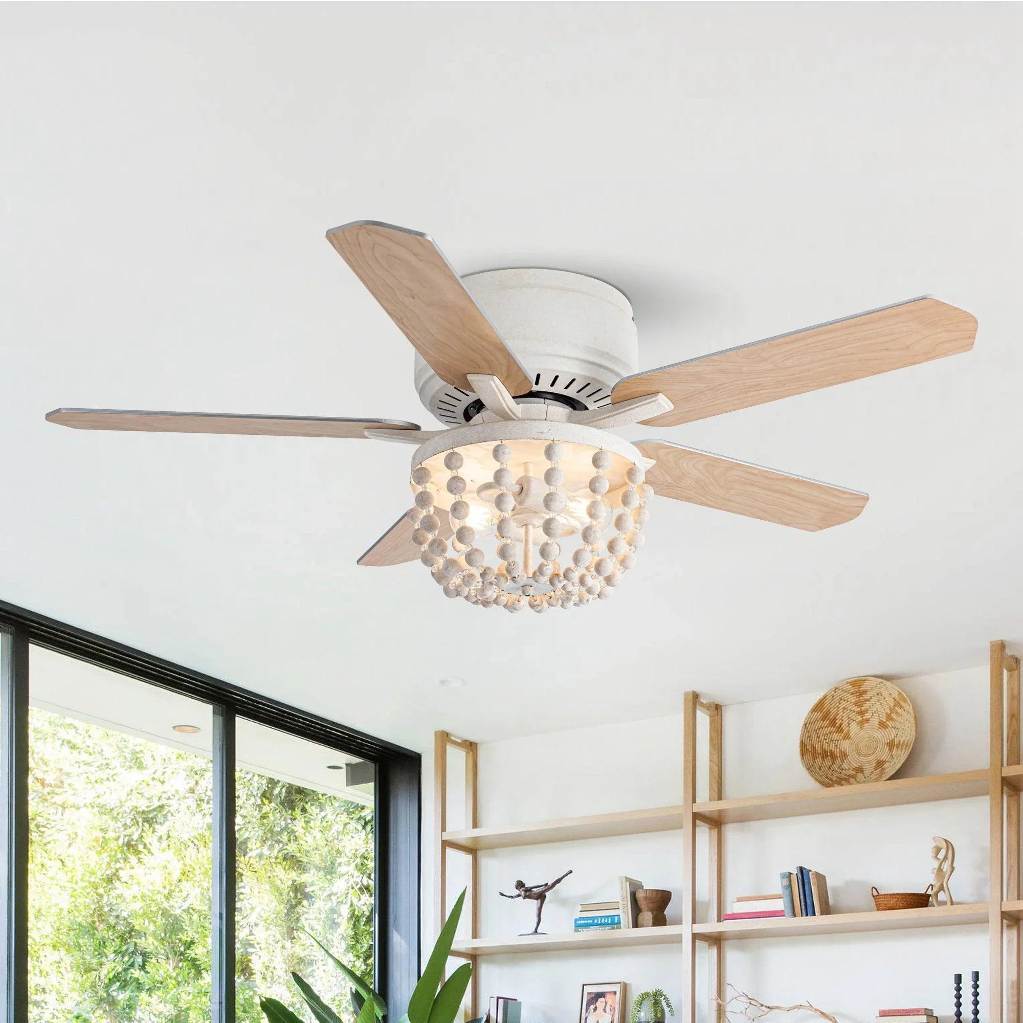 Flush mount ceiling fan with white housing, wood reversible blades, and bead light