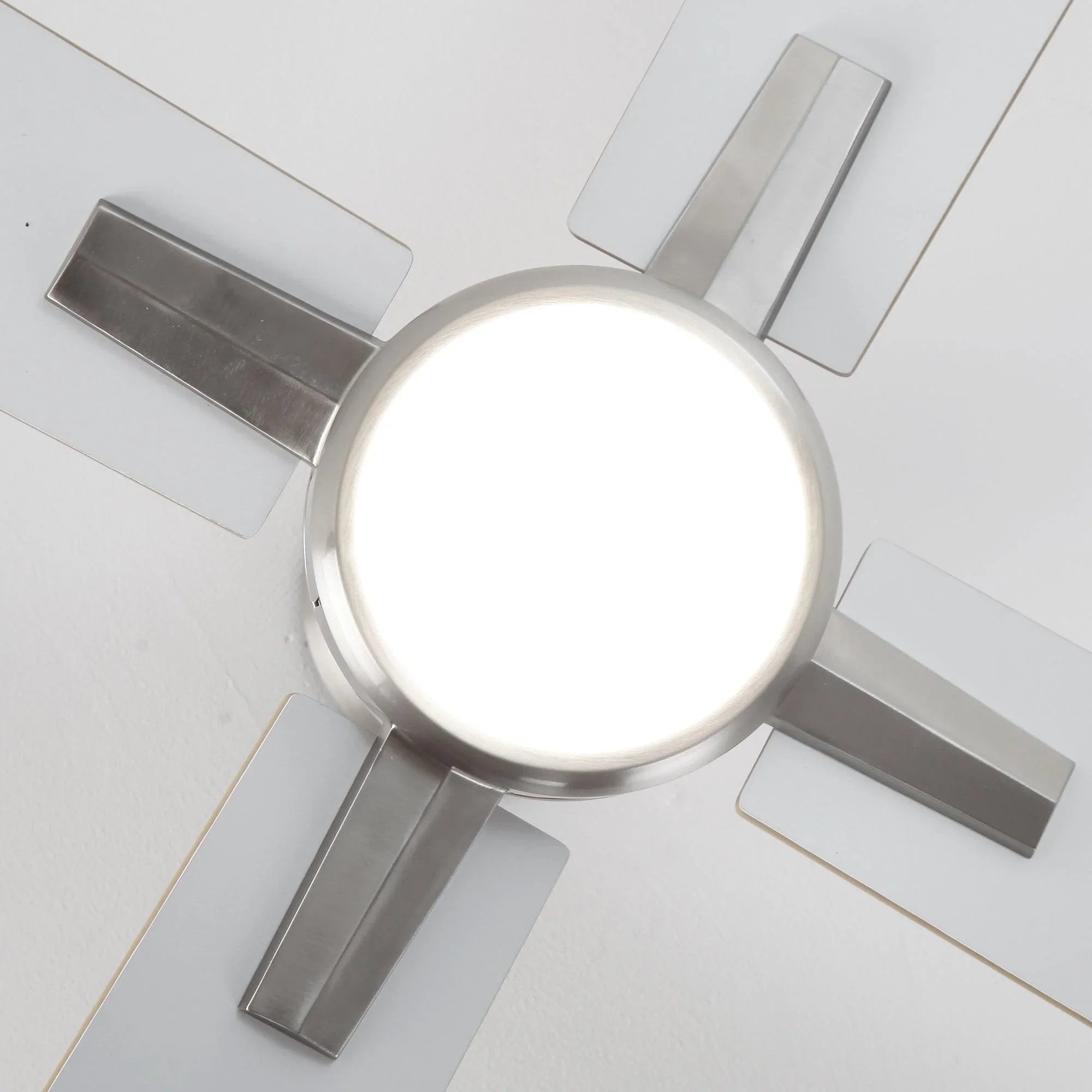 Satin nickel ceiling fan light fixture with four reversible blades