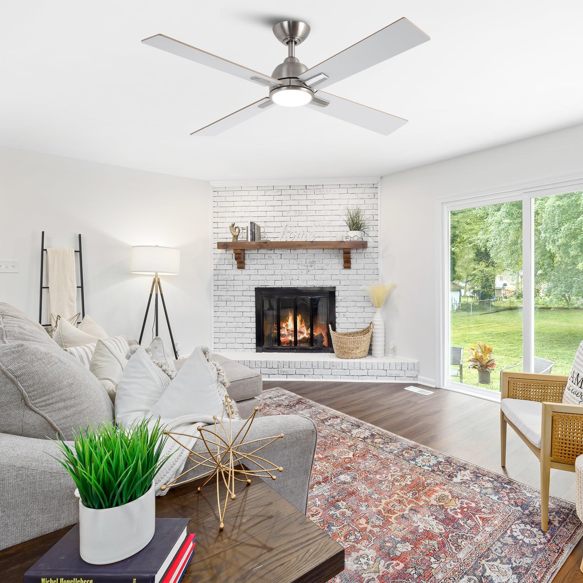 Ceiling fan with satin nickel housing, round LED light, and reversible blades