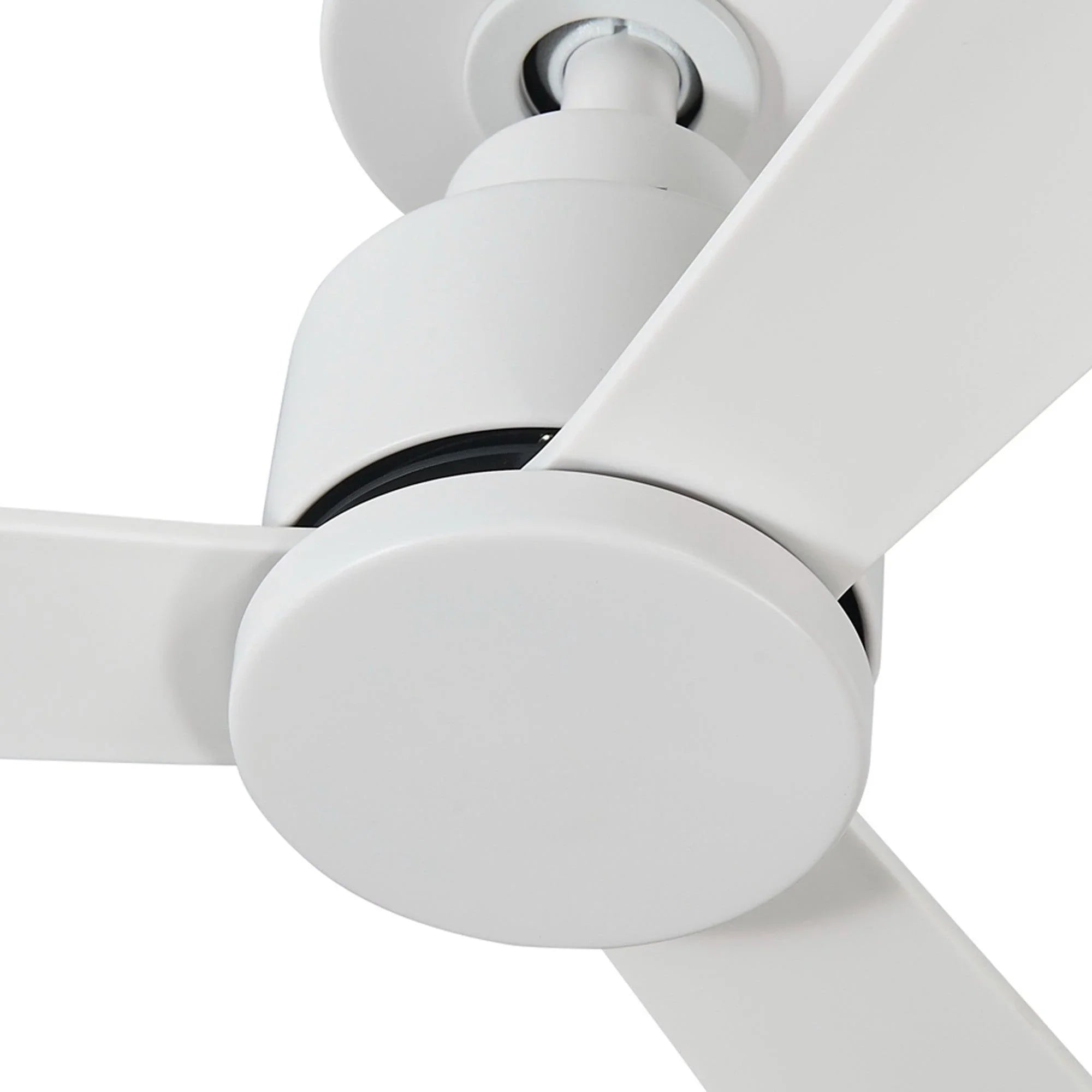 White ceiling fan hub with motor housing and blade attachment, close-up