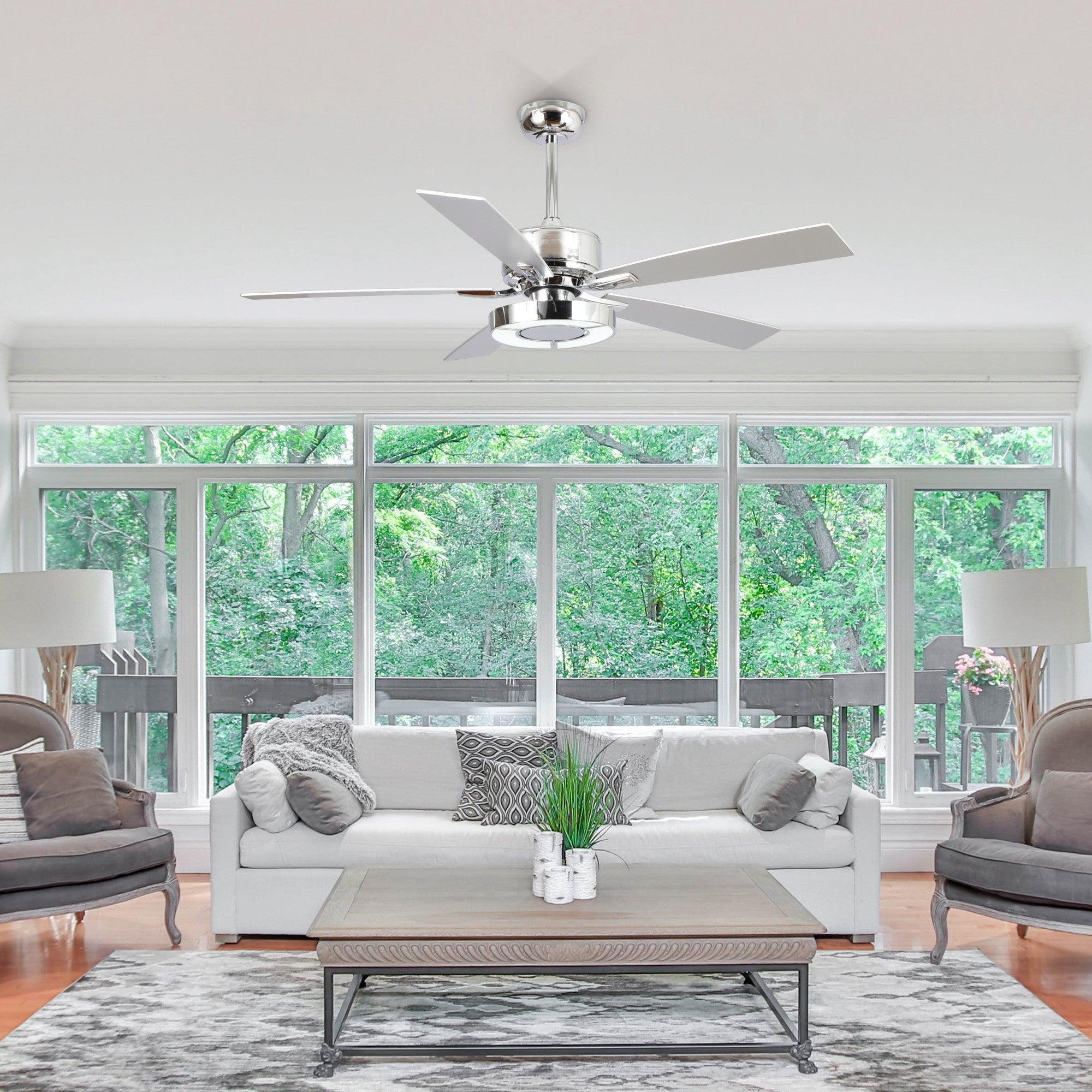 Industrial ceiling fan with chrome housing, light kit, and reversible gray/dark blades