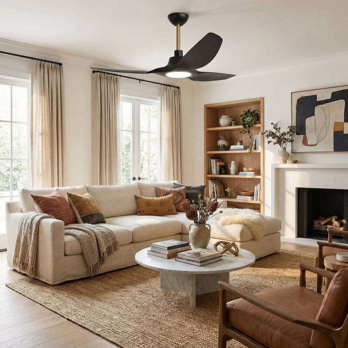 Black ceiling fan with LED light in a living room