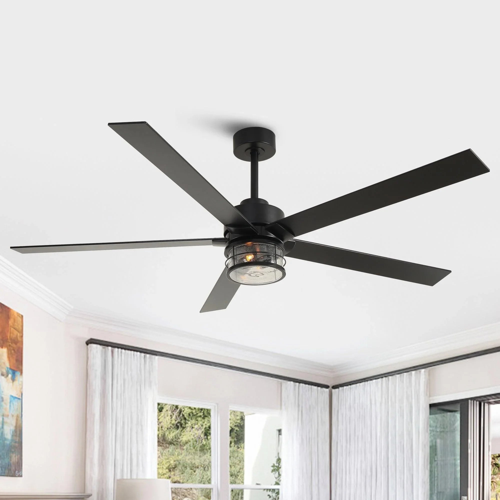 Black modern ceiling fan with integrated light kit and four angled blades