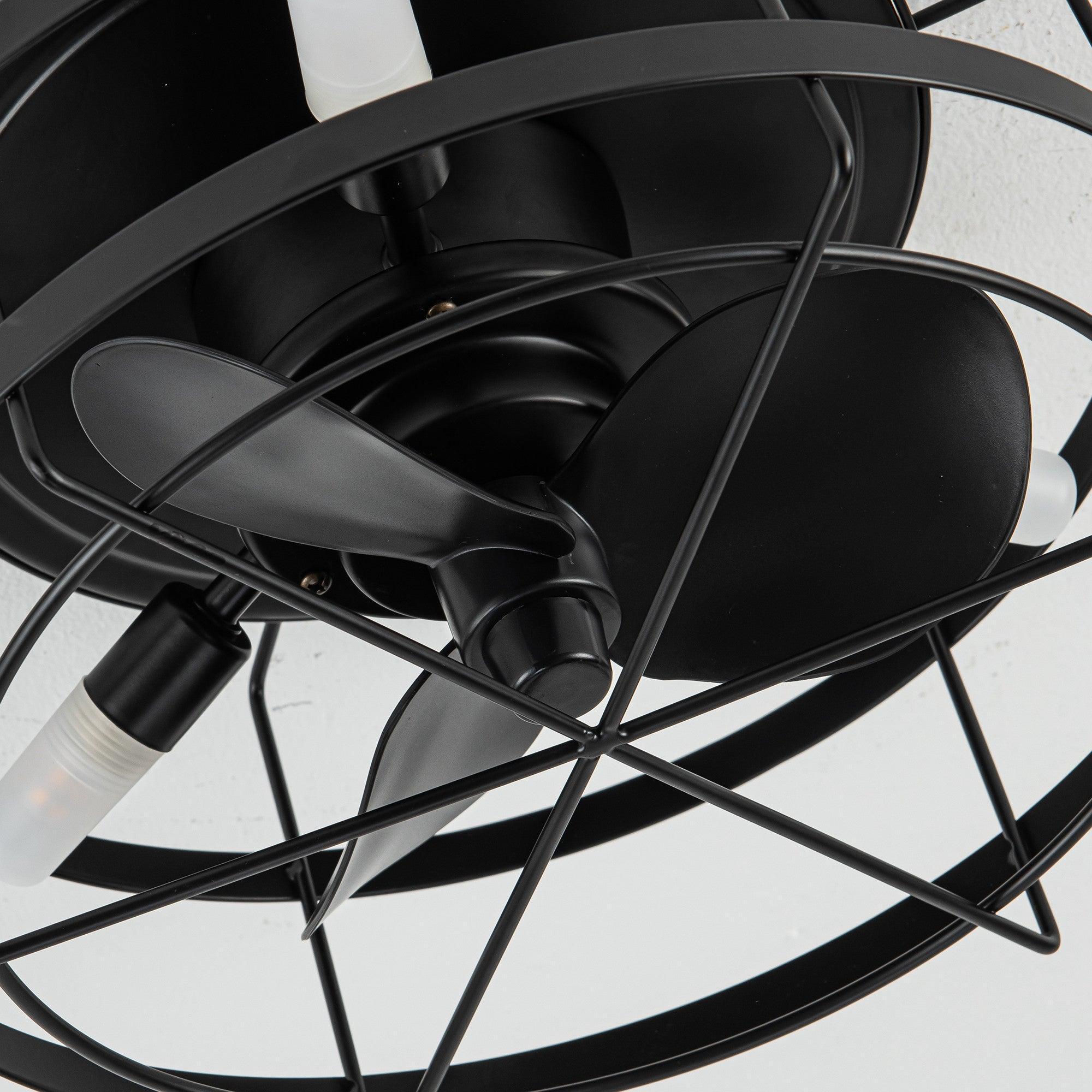Black ceiling fan motor housing with three-blade assembly and wire safety cage